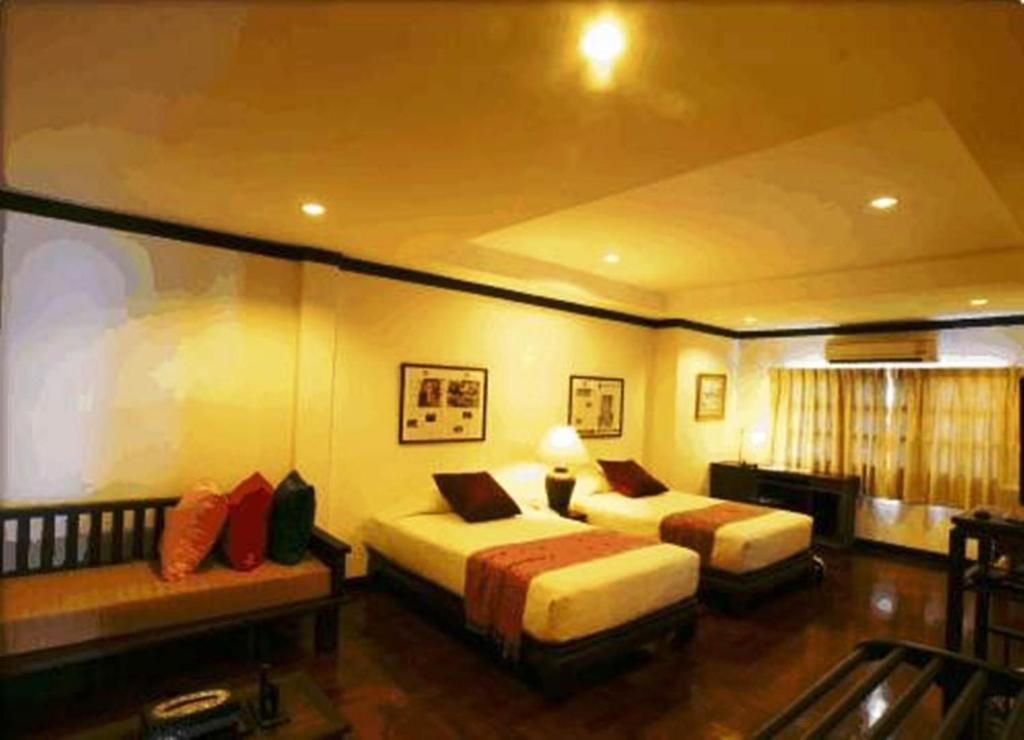 Cucumber Inn Suite Pattaya Quarto foto